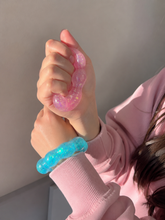 Load image into Gallery viewer, pink Feelzies™ Original Squishy Bracelet: Cotton Candy Sparkle fidget

