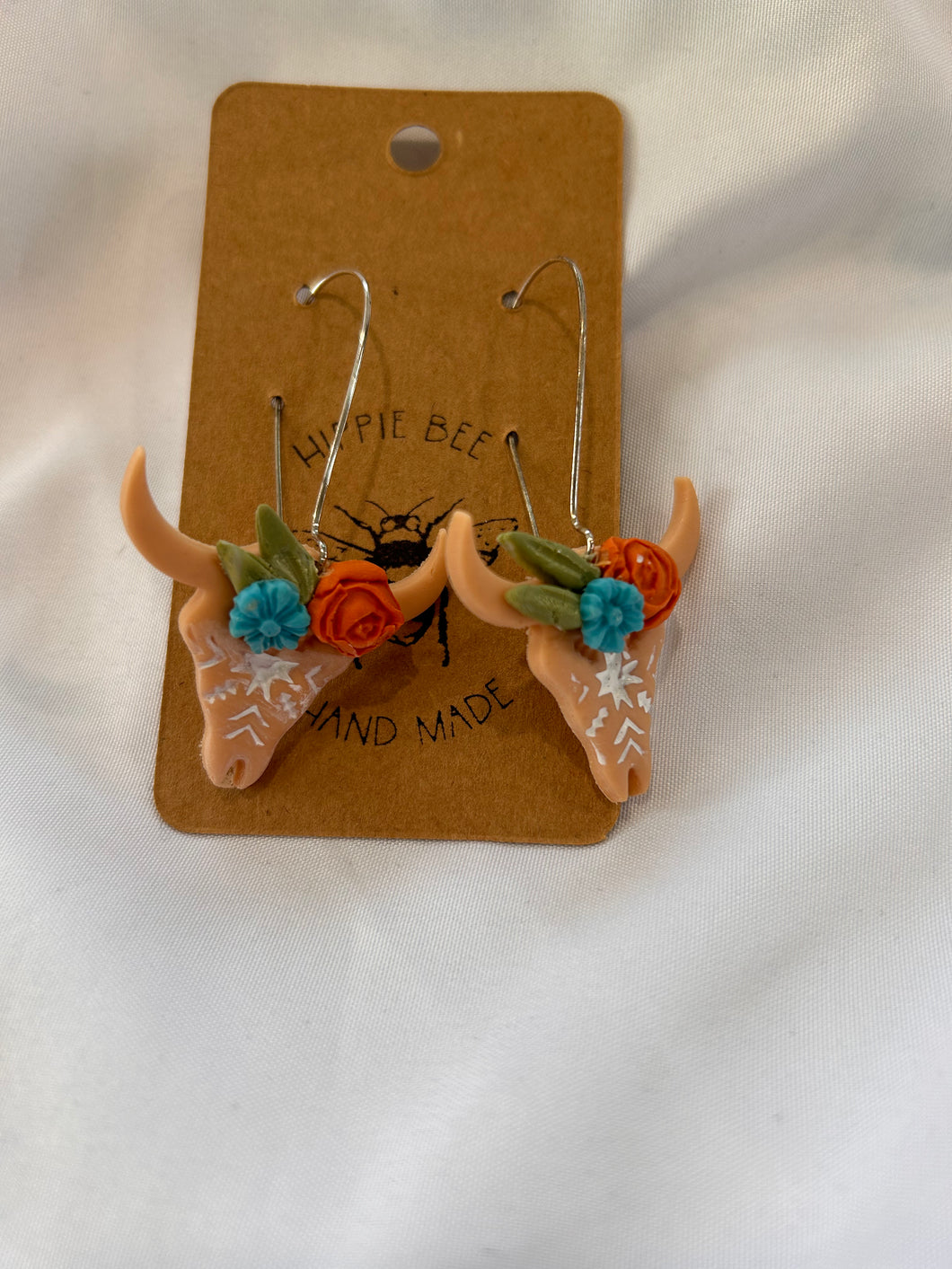 Western floral bull skull polymer dangle earrings