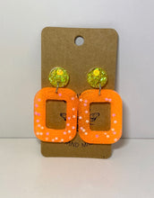 Load image into Gallery viewer, Neons yellow and orange star squoval stud dangles- black light reactive
