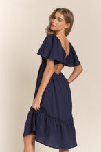 Load image into Gallery viewer, J.NNA Smocked Bow Back Ruffle Hem Dress
